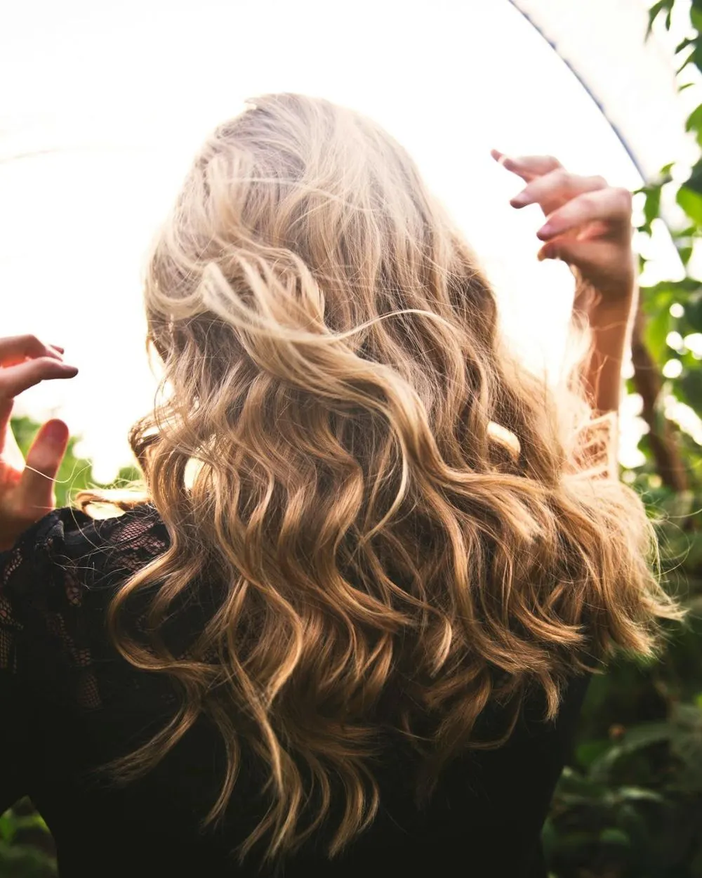 Soft blonde waves in sunlight
